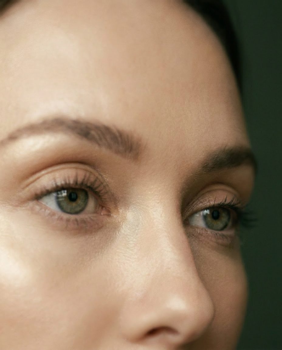 Close detail of skin around the eyes, unretouched, in warm side light